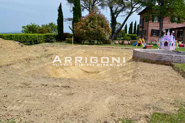 Scavo piscina di sabbia